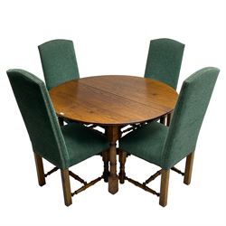 Quality oak circular extending dining table, on turned supports united by x cross stretcher, together with set four matching high back chairs upholstered in green fabric, turned supports joined by turned stretchers (extended length with single leaf 170cm)