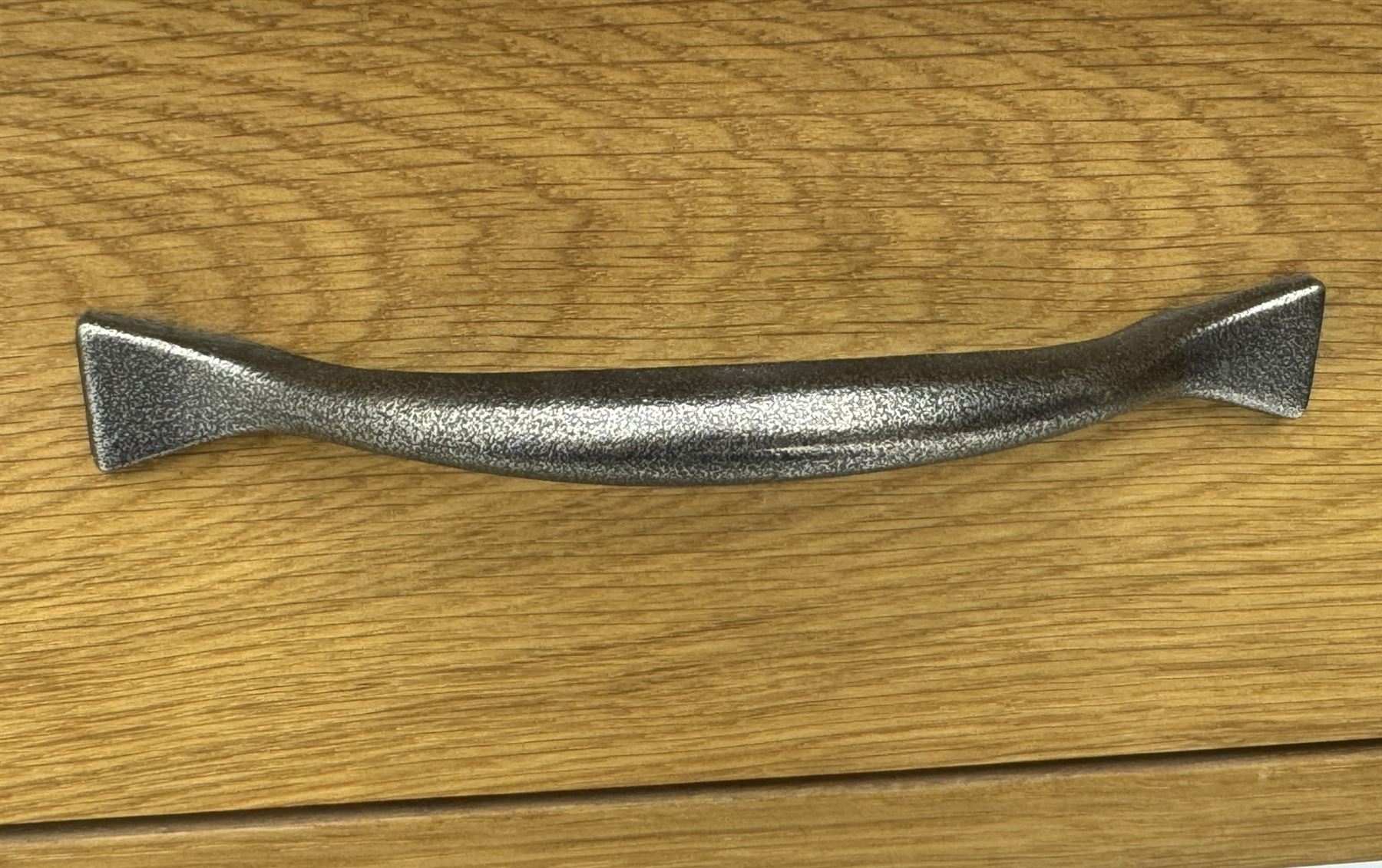 Laura Ashley - contemporary Milton oak console table, rectangular top over two drawers with pewter effect bow handles, on square legs supported by stretcher 