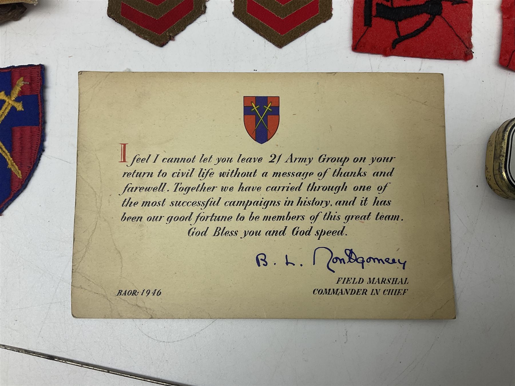 Small quantity of militaria and other items, including Montgomery printed signature, badges, paper ephemera, coins, silver Albertina chain, hat pins, etc