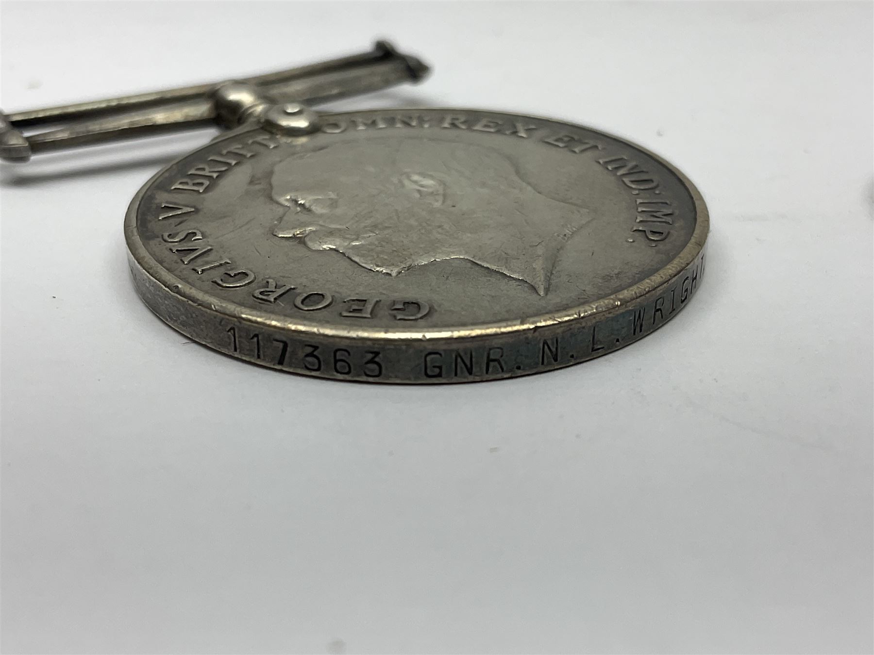 WWI J. Hudson & Co. Birmingham trench whistle dated 1916; WWI British War Medal awarded to 117363 Gnr. N.L. Wright R.A.; Services Rendered badge No.111643; RAF & RFC cap badges etc