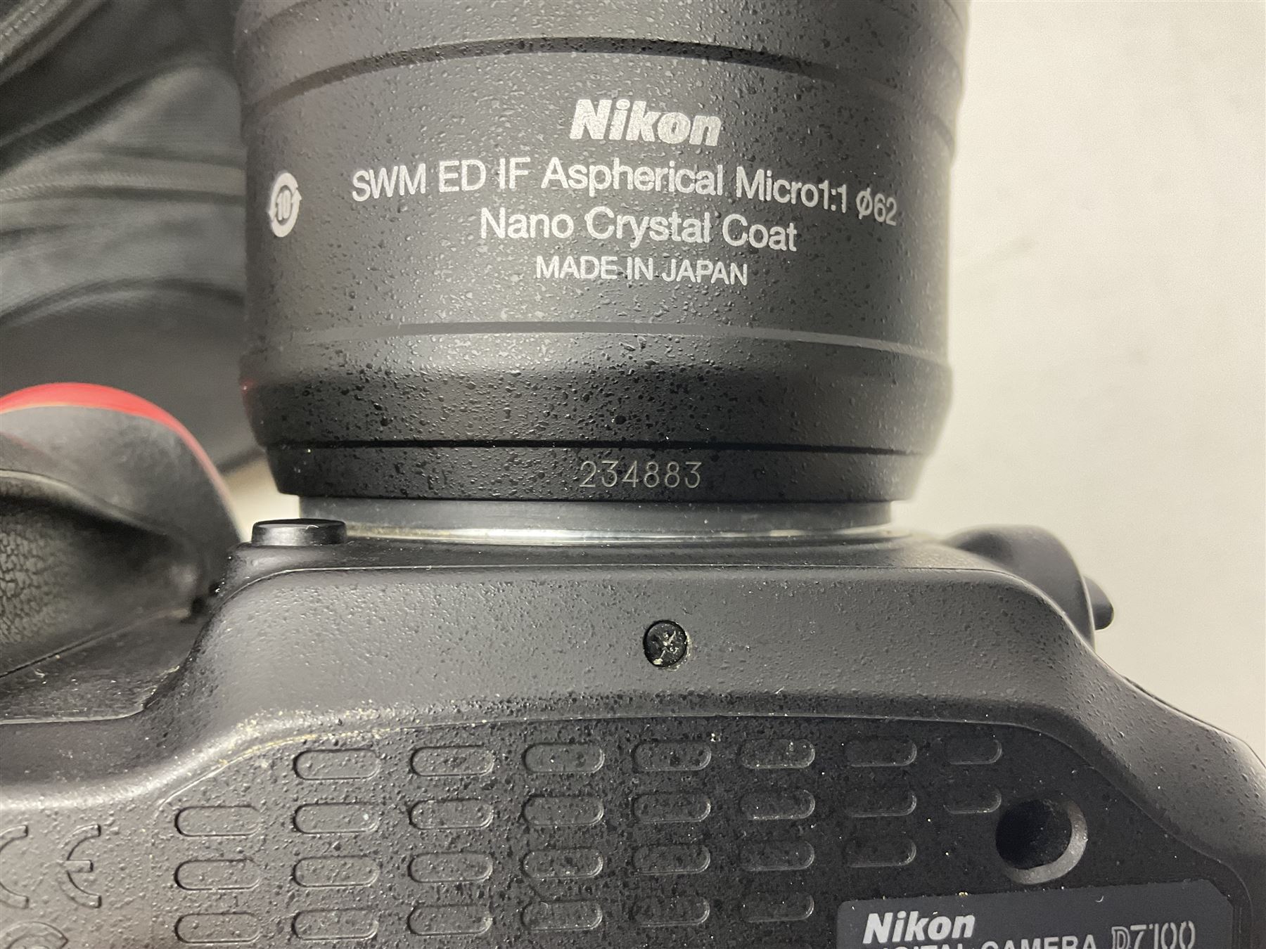 Nikon D7100 camera body, serial no 4370016, with Nikon 'AF-S Micro Nikkor 60mm 1:2.8G ED' lens serial no 234883 and battery Grip HN-D7100, with Lowepro camera bag  