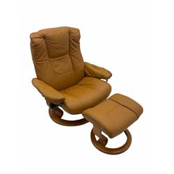 Stressless reclining armchair with matching stool, upholstered in tan leather