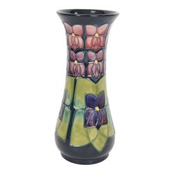 Moorcroft vase Violets pattern, of slender fluted form, with original box H21cm