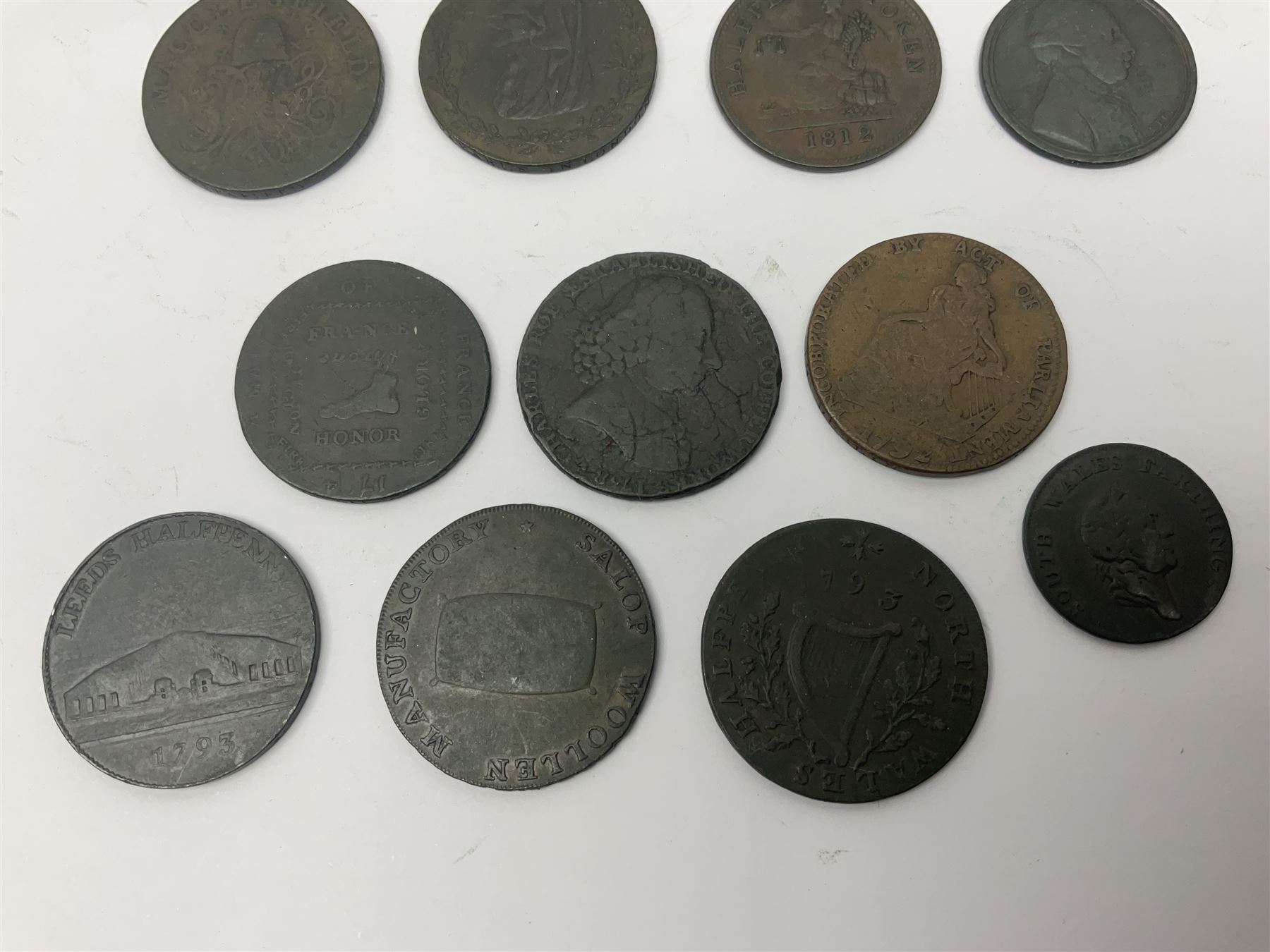 Thirty six late 18th century onwards tokens to include Georgian love token engraved ‘Betty Barlow’ to reverse of 1788 Anglesey Mines halfpenny, 1792 Coventry halfpenny, 1792 North Wales halfpenny, 1795 Duke of York halfpenny etc 