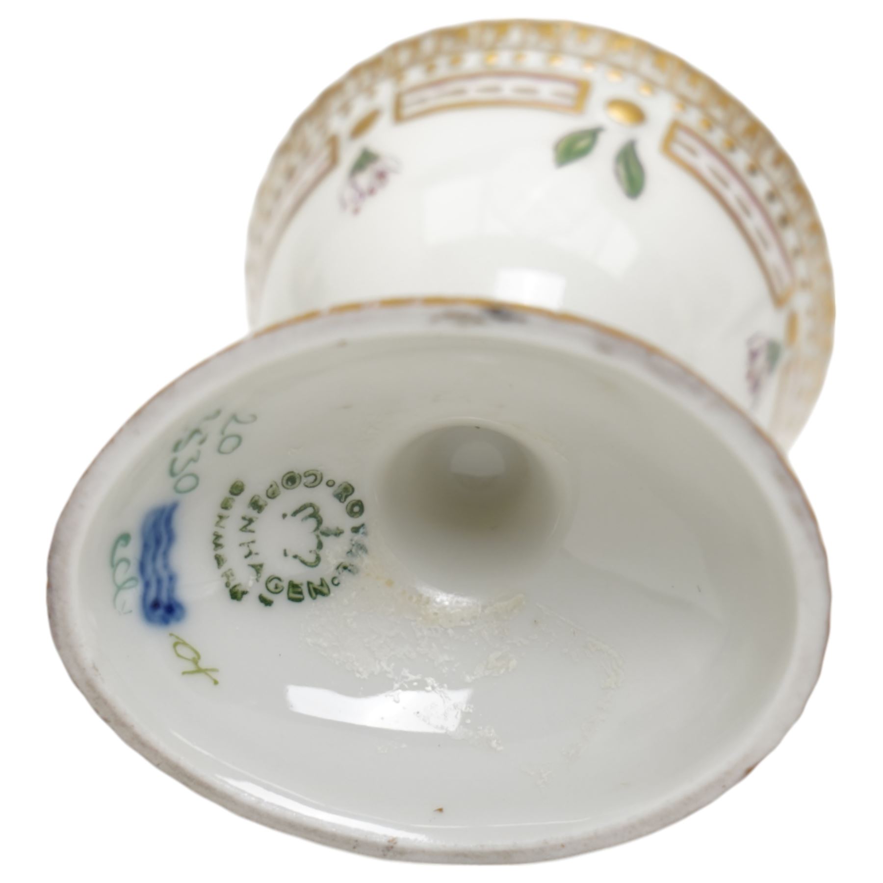 Royal Copenhagen Flora Danica wares, comprising covered mustard pot with naturalistically modelled vine handles and decorated with Cushion Pink (Cucubalius Acaulis) H8cm, milk jug decorated with Maiden Pink (Dianthus Deltoides) H7cm, covered dish decorated with Dwarf Milkwort (Polygala Amarum) W8cm, oval salt cellar decorated with Alpine Squill (Scilla Bifolia) W11cm, egg cup, pin dish and cased hand mirror, various Latin specimen inscriptions to base, all with printed and painted marks beneath (7)