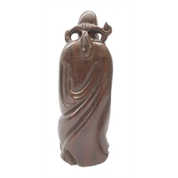 RTV A carved Chinese hardwood figurine, modelled as a sage, H41cm.   