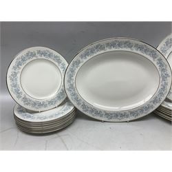 Royal Doulton tea and dinner wares in the Meadow Mist pattern, no H5007, comprising seven dinner plates, eight side plates, two lidded tureens, two jugs, lidded sucrier, oval serving dish, six teacups, seven saucers, seven tea plates and large saucer