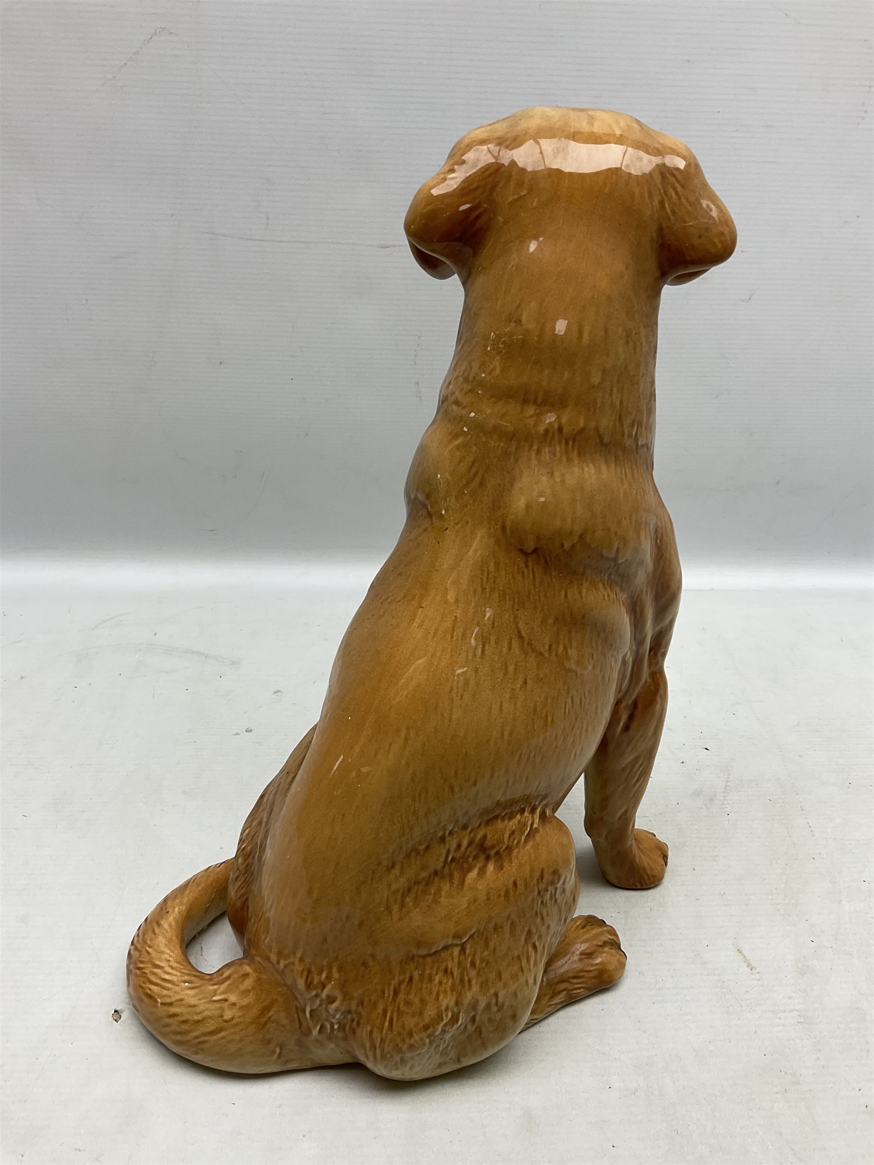 Large Beswick fire side figure of a yellow labrador, modelled seated, no. 2314, with impressed marks beneath, H34cm