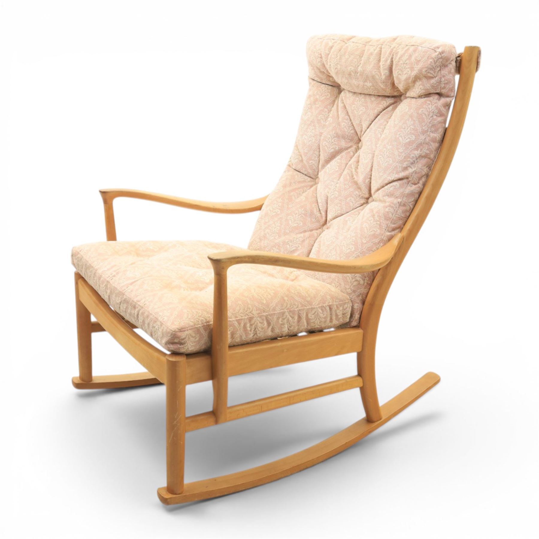 Parker Knoll -model '480' rocking beechwood chair, loose seat cushions above an elasticated webbing seat, curved rocker base 