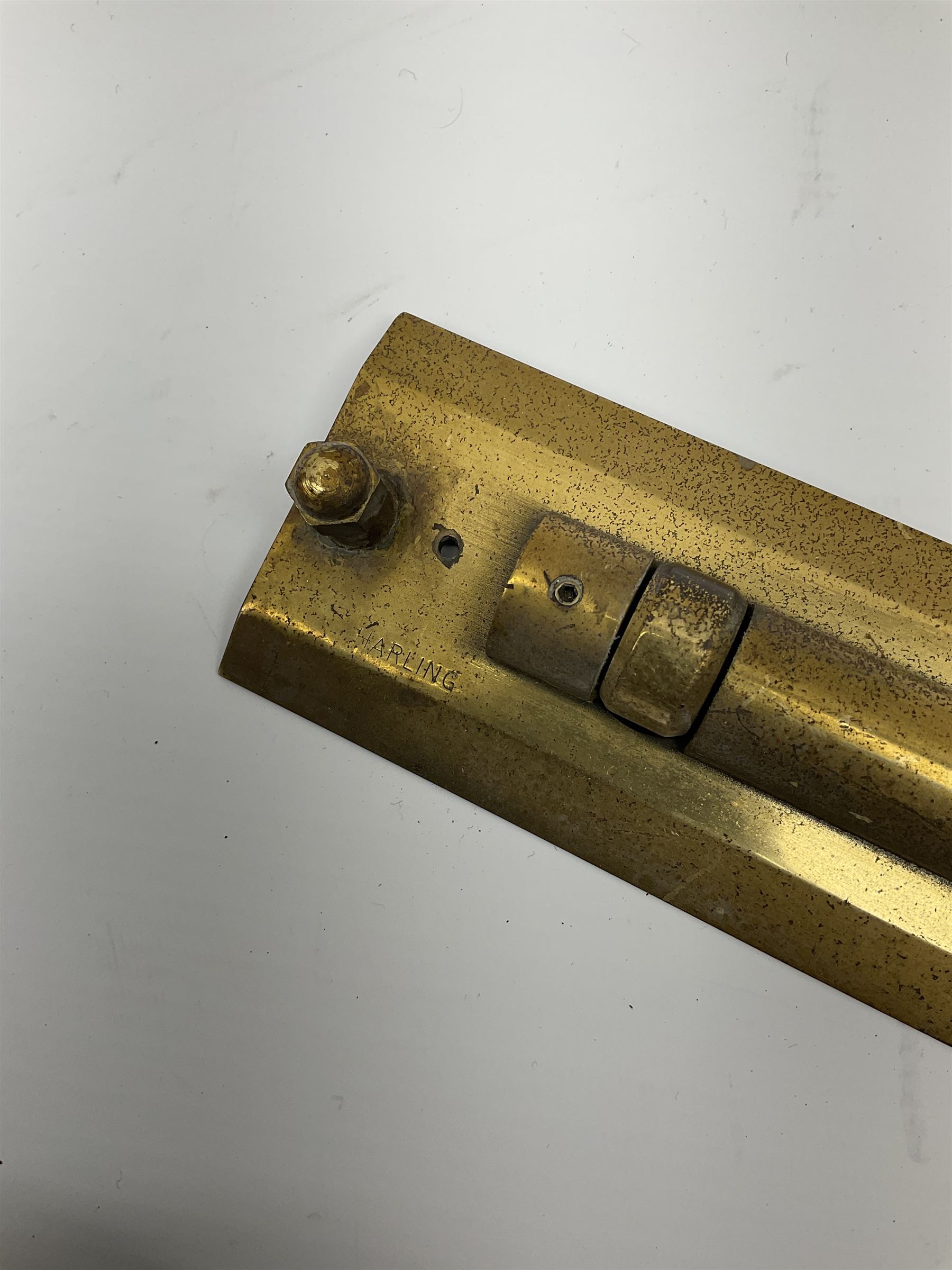 Brass and black painted maritime station pointer inscribed 6675-99-777-3202 Serial No.WMEL 0041 L45.5cm; Harling brass rolling ruler Patt.No.160100; and a parallel ruler; all unboxed (3)