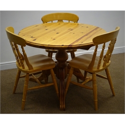  Circular pine table, single turned column on three splayed supports (D105cm, H76cm) and three beech farmhouse style chairs  