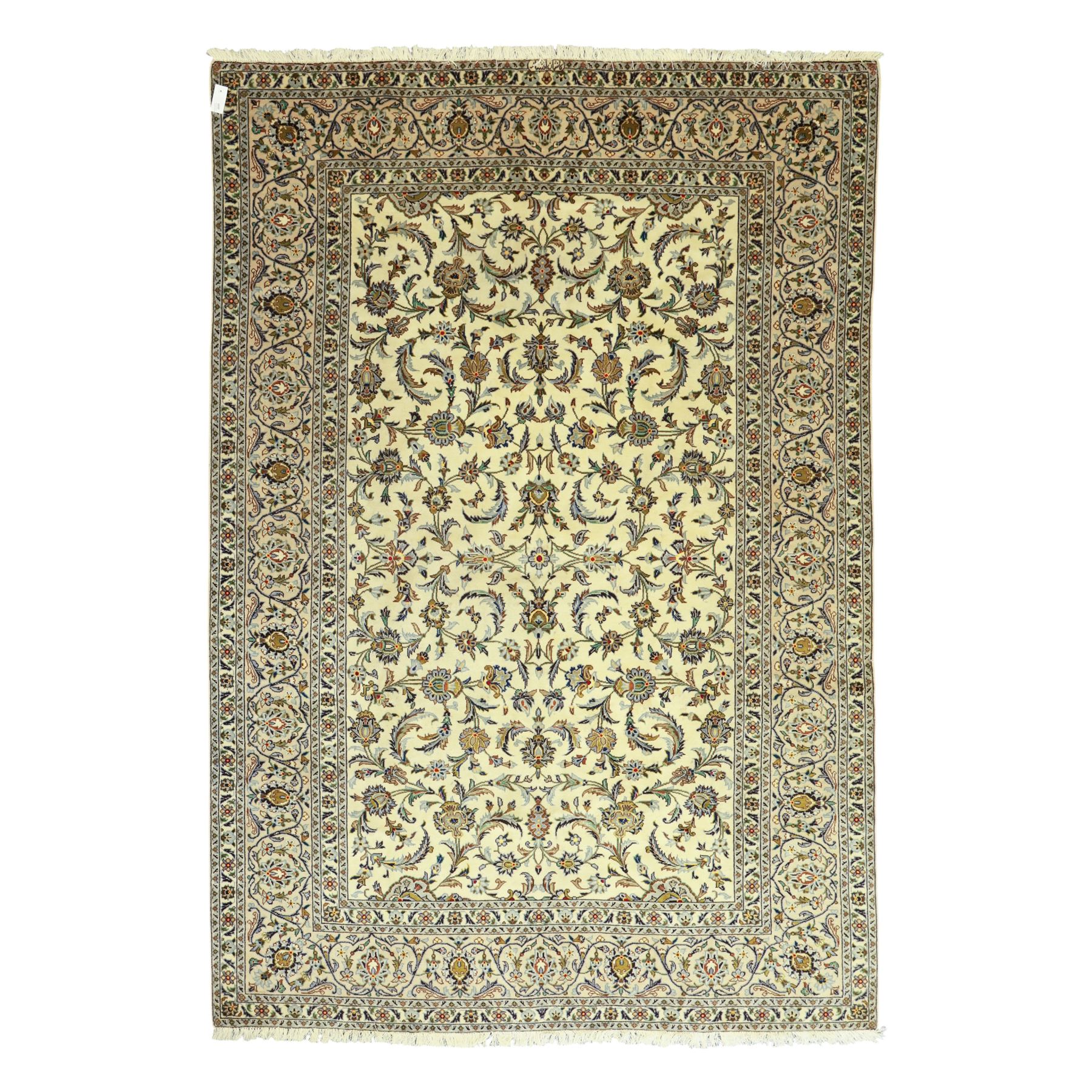 Central Persian Kashan carpet, ivory ground, field with an all-over design of scrolling palmettes and floral sprays in blue and terracotta within a beige ground and pale blue floral border