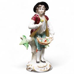 Group of Sitzendorf porcelain figures, one modelled as two children with birds and lambs, the others holding and offering flowers, each upon gilt detailed base, with painted marks beneath (4)