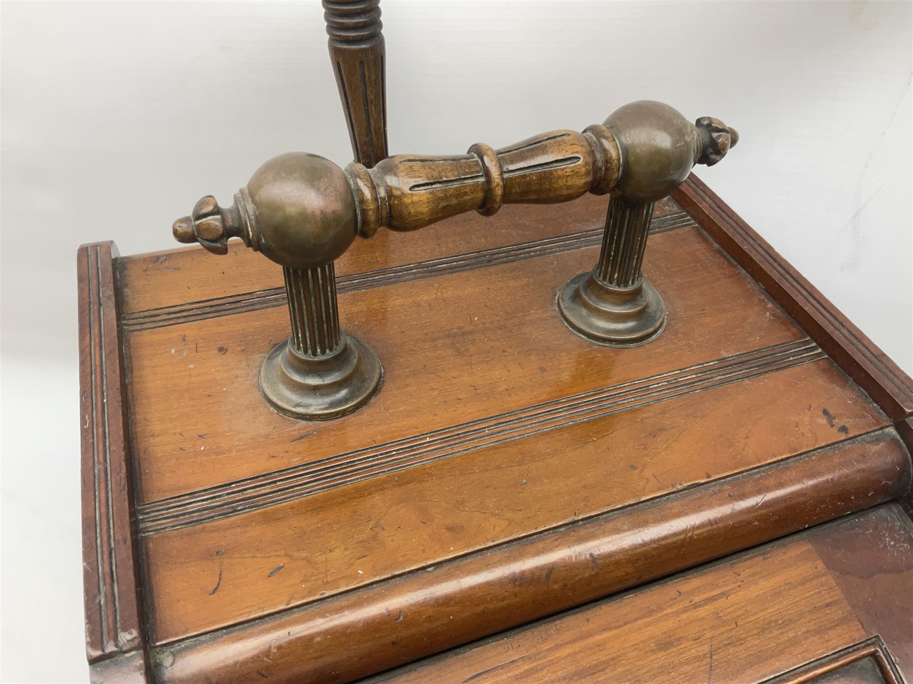 Victorian mahogany coal scuttle, the domed rolling lid carved with ornate foliate motifs opening to reveal interior with twin handled liner, mounted with carrying handle and shovel, together with brass fireside tools, largest H46cm