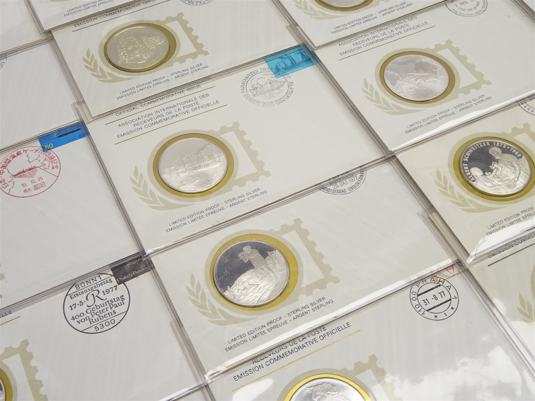 Twenty-eight sterling silver proof medallic first day covers, 'In Commemoration of the 400th Anniversary of the Birth of Peter Paul Rubens', each medallion, minted by the Franklin Mint, is housed within an 'International Society of Postmasters Official Commemorative Issue' cover, with accompanying certificate (28)

[image code: 7mc]