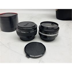 Nikon F3 SLR camera, serial number 1583609; Nikon 50mm 1:1.8 lens; Nikon 28-85mm 1:3.5-4.5 zoom lens; Vivitar MC 2X-3 Tele Converter, and a Nikon Speedlight SB-16 flash