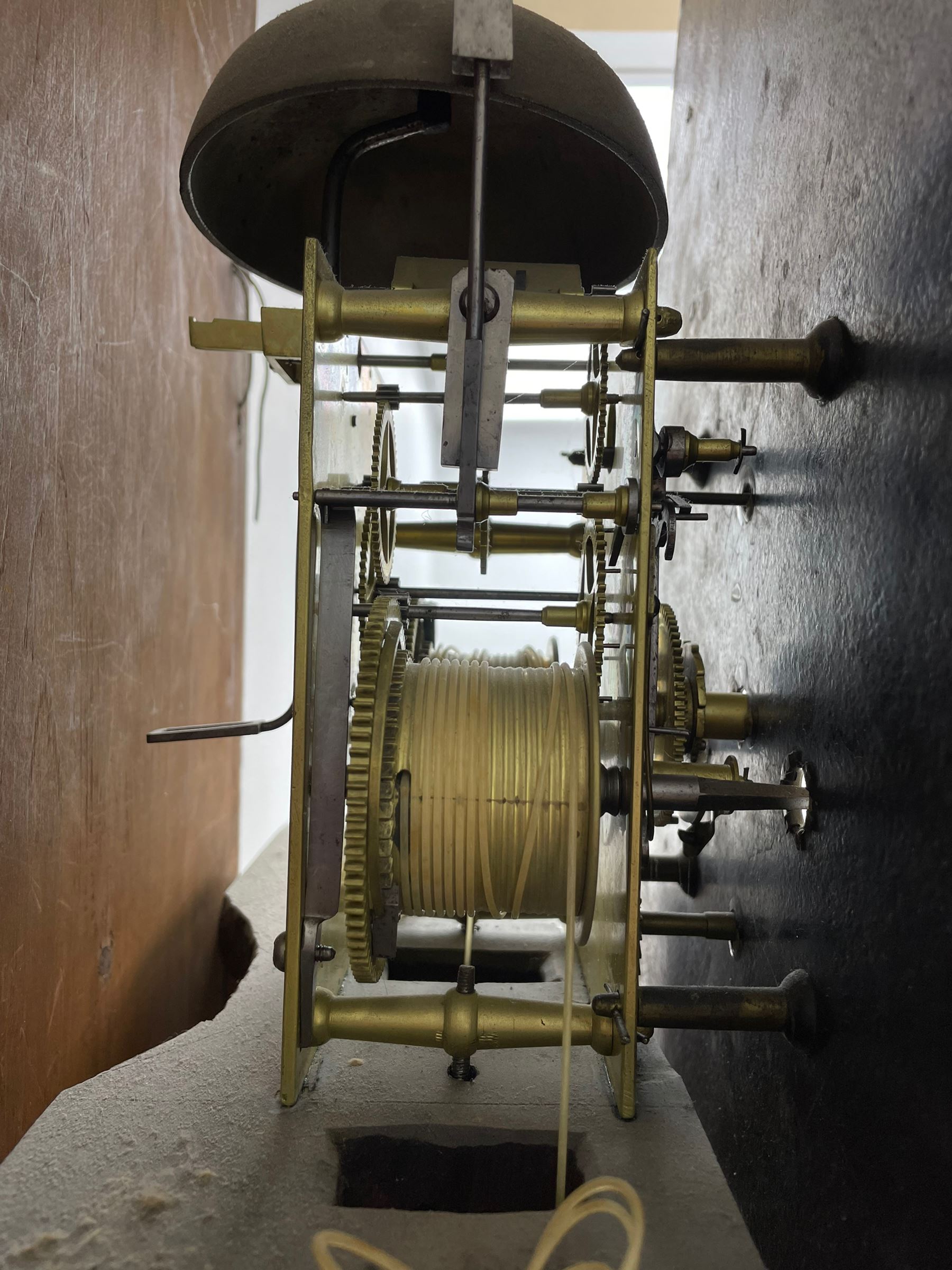 Samuel Ritchie of Forfar - William IV 8-day Scottish longcase clock in a mahogany case, with a swans neck pediment, brass paterae and three ball and spire brass finials, case and trunk inlaid with satinwood stringing on a plinth raised on decorative bracket feet, painted break arch dial depicting a costal scene to the break arch and conch seashells to the spandrels, Roman numerals, subsidiary seconds and date dials with matching steel hands, with a rack striking movement striking the hours on a bell. With weights, key, and pendulum.  Samuel Ritchie is recorded as working in Forfar 1800-37.