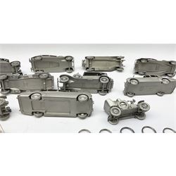 Twelve Danbury Mint pewter models of vehicles including Rolls Royce '1936 Park Ward Baby Rolls', Rolls Royce '1907 The Silver Ghost' etc and a small number of pin badges and car fobs