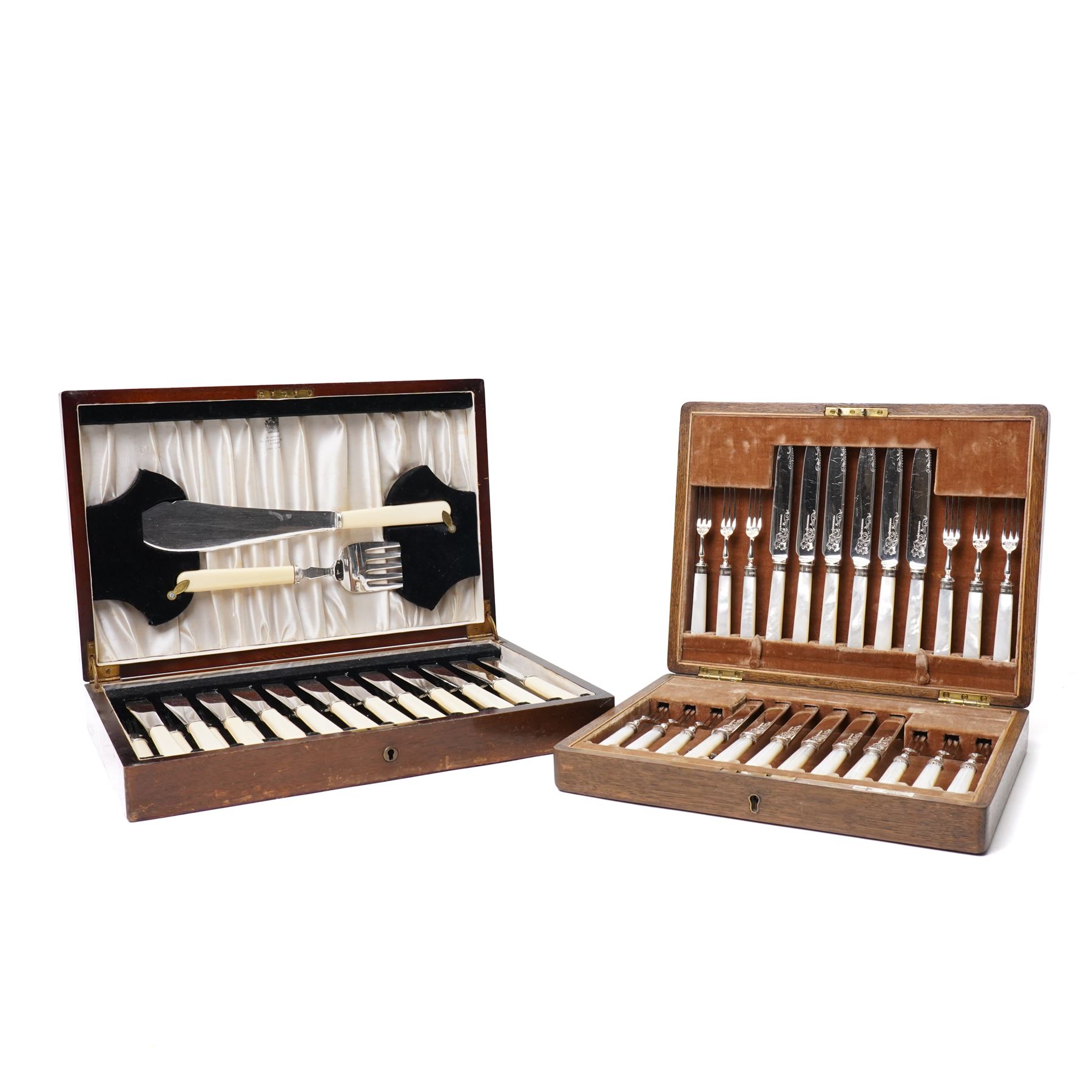 Set of twelve dessert knives and forks with engraved plated blades, silver collars and mother of pearl handles by Walker & Hall in oak box Sheffield 1927 and a set of twelve plated fish knives and forks with servers, boxed
