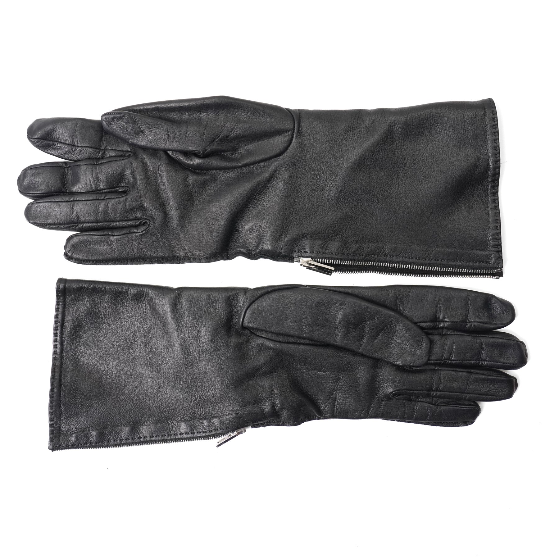 Hermès - pair of black leather long gloves, with H monogram zip fastening to the outer wrist and palladium-tone hardware, with original box