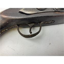 Reproduction flintlock pistol, the full walnut stock with brass filigree inlay and mounts and skull crusher butt L46cm; no visible proof marks FIREARMS CERTIFICATE REQUIRED OR RFD