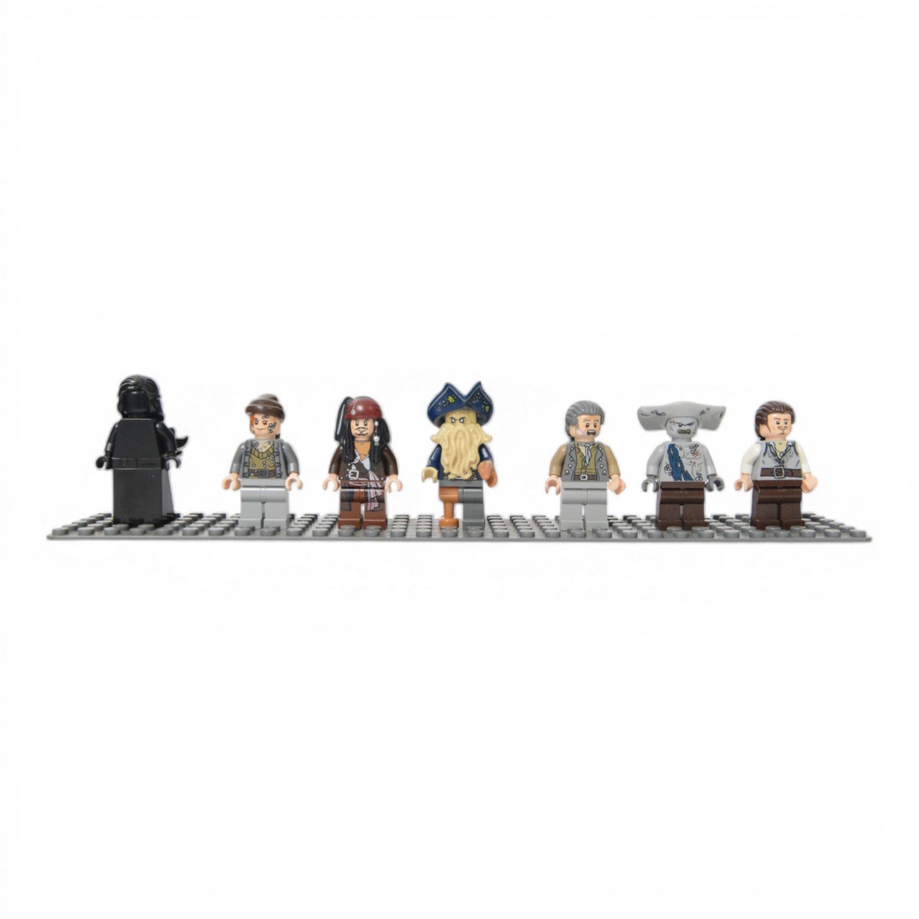 Lego Pirates of the Caribbean Black Pearl minifigure set no. 4184, comprising Black Pearl figurehead, Bootstrap Bill, Captain Jack Sparrow, Davy Jones, Joshamee Gibbs, Maccus and Will Turner