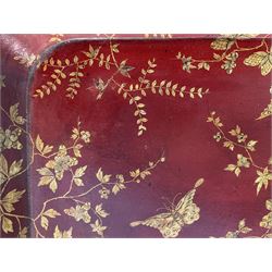 Early 19th century red lacquered papier-mâché tray by Clay of King Street Covent Garden, of rounded rectangular form, painted in gilt with large foliate sprays and butterflies, impressed verso CLAY KING ST COVENT GARDEN, W66.5cm D48.5cm