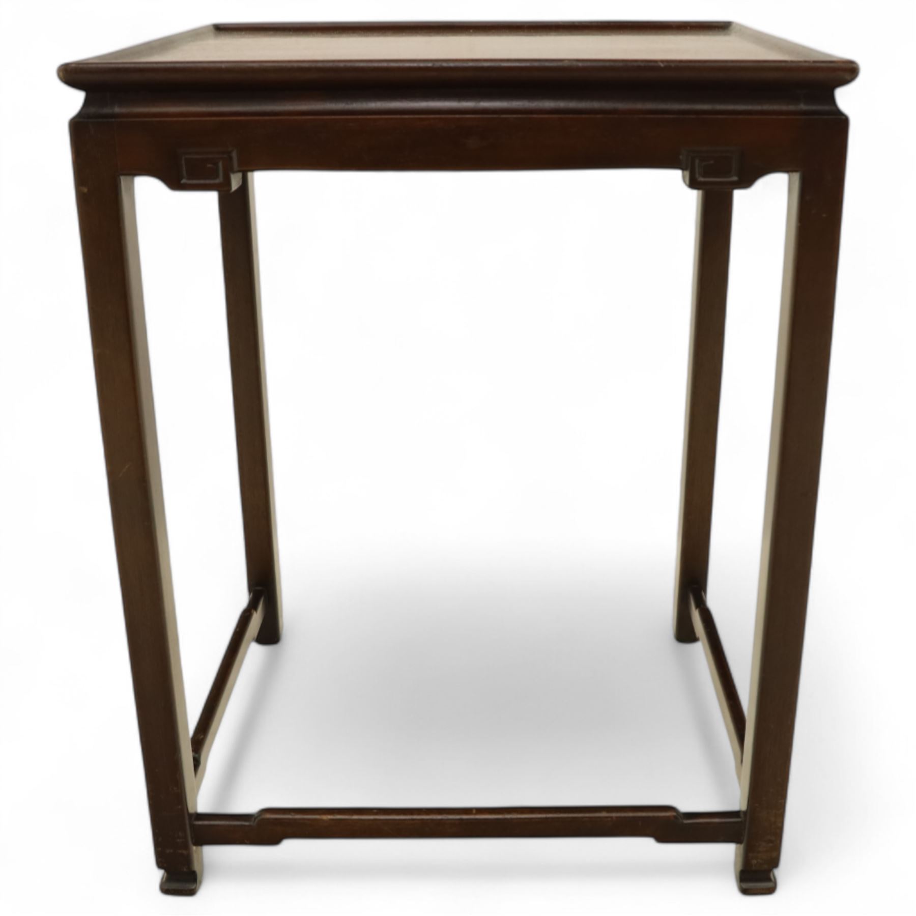 Whytock & Reid, Edinburgh  - Edwardian nest of three Chinese-style solid mahogany occasional tables, rectangular top with finely moulded edge above slim square section legs with subtly chamfered inner edges, joined by H-shaped stretchers, largest W40xD33xH52cm