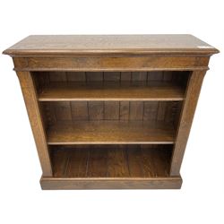 Traditional oak open bookcase, rectangular moulded top over three adjustable shelves, on moulded plinth base