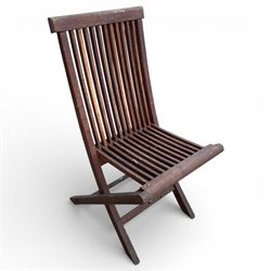 Hexagonal garden table and set of four folding chairs