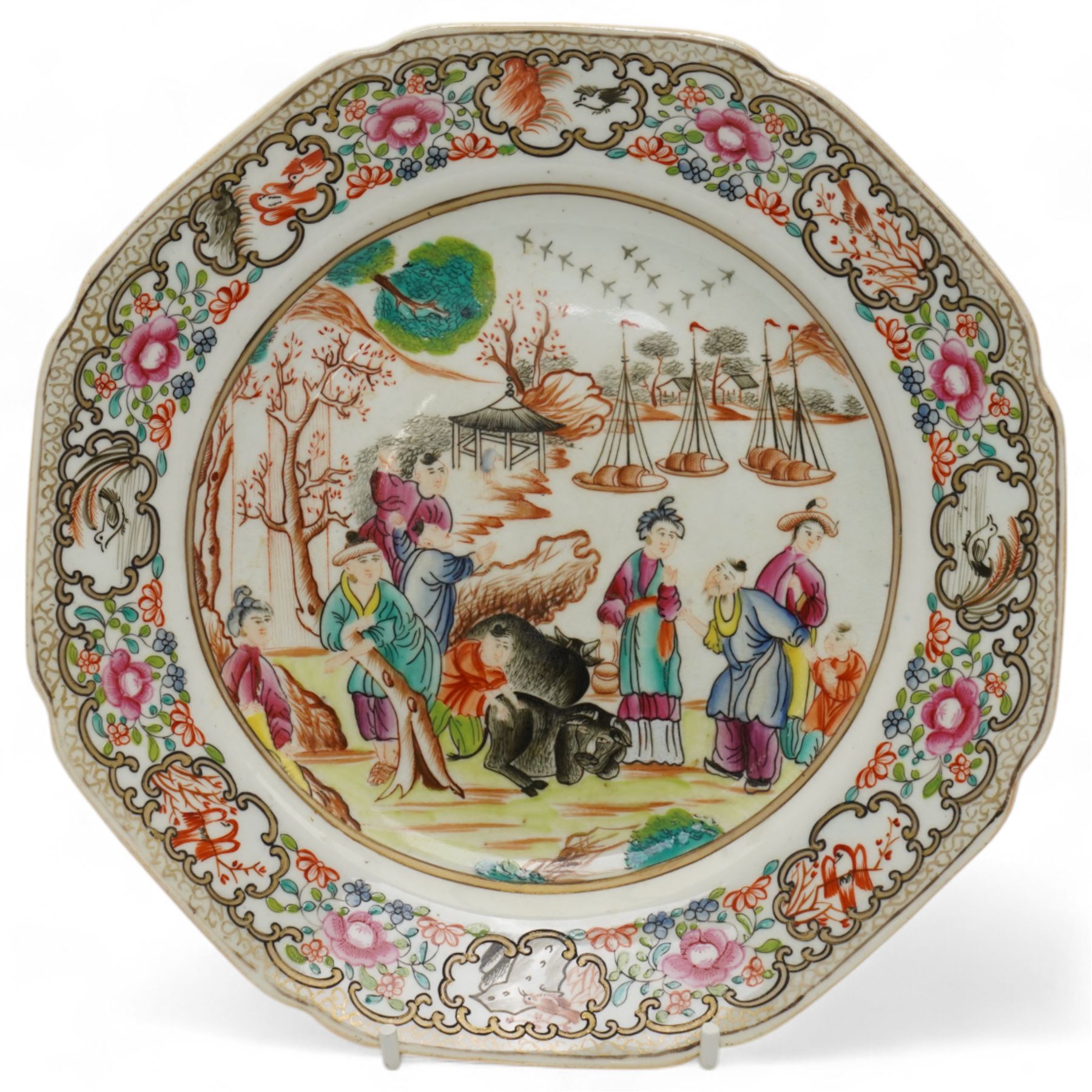18th century Liverpool porcelain plate, decorated with Mandarin figures and buffaloes in a harbour, the border decorated with scenes of birds and foliage, D19cm 
