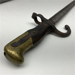 Two 19th century French model 1874 epee bayonets, each with 52cm steel blade, and armoury dates for 1880 and 1881 L64cm overall (2)