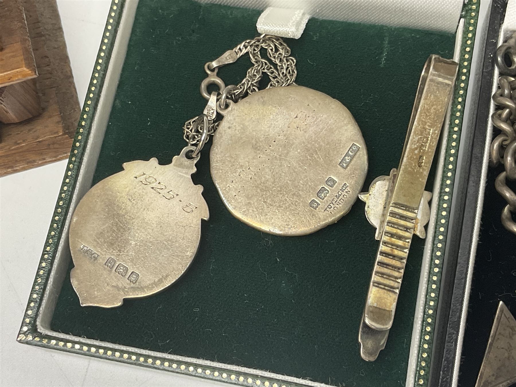 Victorian and later silver jewellery including fob with rose gold cartouche, cross pendant, enamel Yorkshire rose tie pin and fob bracelet,  together with an Edwardian silver vesta case, hallmarked Birmingham 1907, a wooden pocket watch case and three costume brooches 