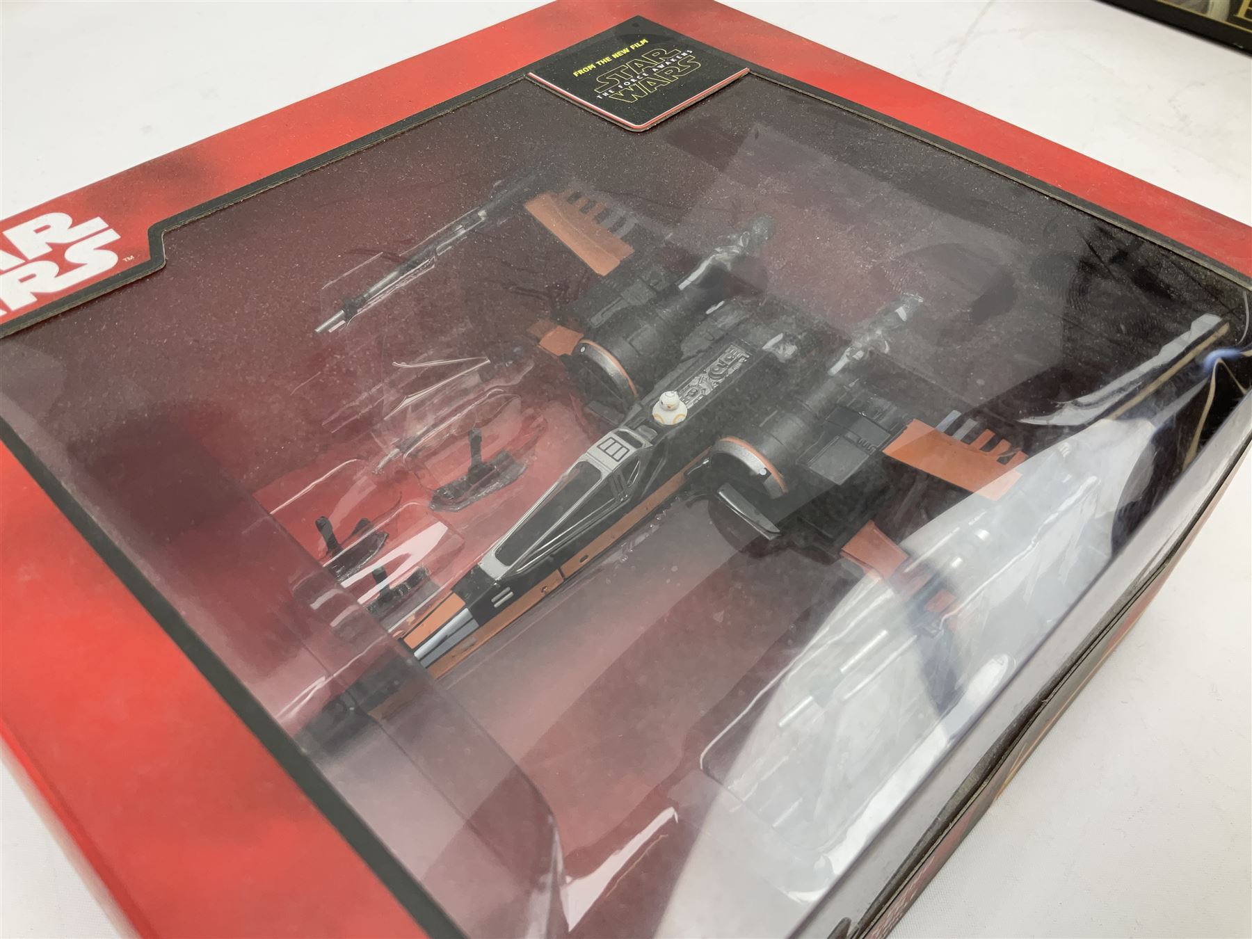 Star Wars - Disney Store The Force Awakens figurine playset, Poe's X-Wing Fighter, Snowspeeder and First Order Tie Fighter; Solo figurine set; The Last Jedi Elite Series die-cast action figure of Praetorian Guard; all mint and boxed; together with Star Wars Episode 1 card game, boxed (7)
