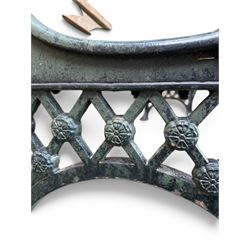 Neoclassical design cast iron and oak slatted garden bench, the twin end supports in the form of a Sphinx with acanthus carved knees and large paw feet, the pierced lattice bracket with Yorkshire rose motifs