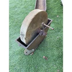 Small stone sharpening wheel, and a shallow cast iron trough - THIS LOT IS TO BE COLLECTED BY APPOINTMENT FROM DUGGLEBY STORAGE, GREAT HILL, EASTFIELD, SCARBOROUGH, YO11 3TX