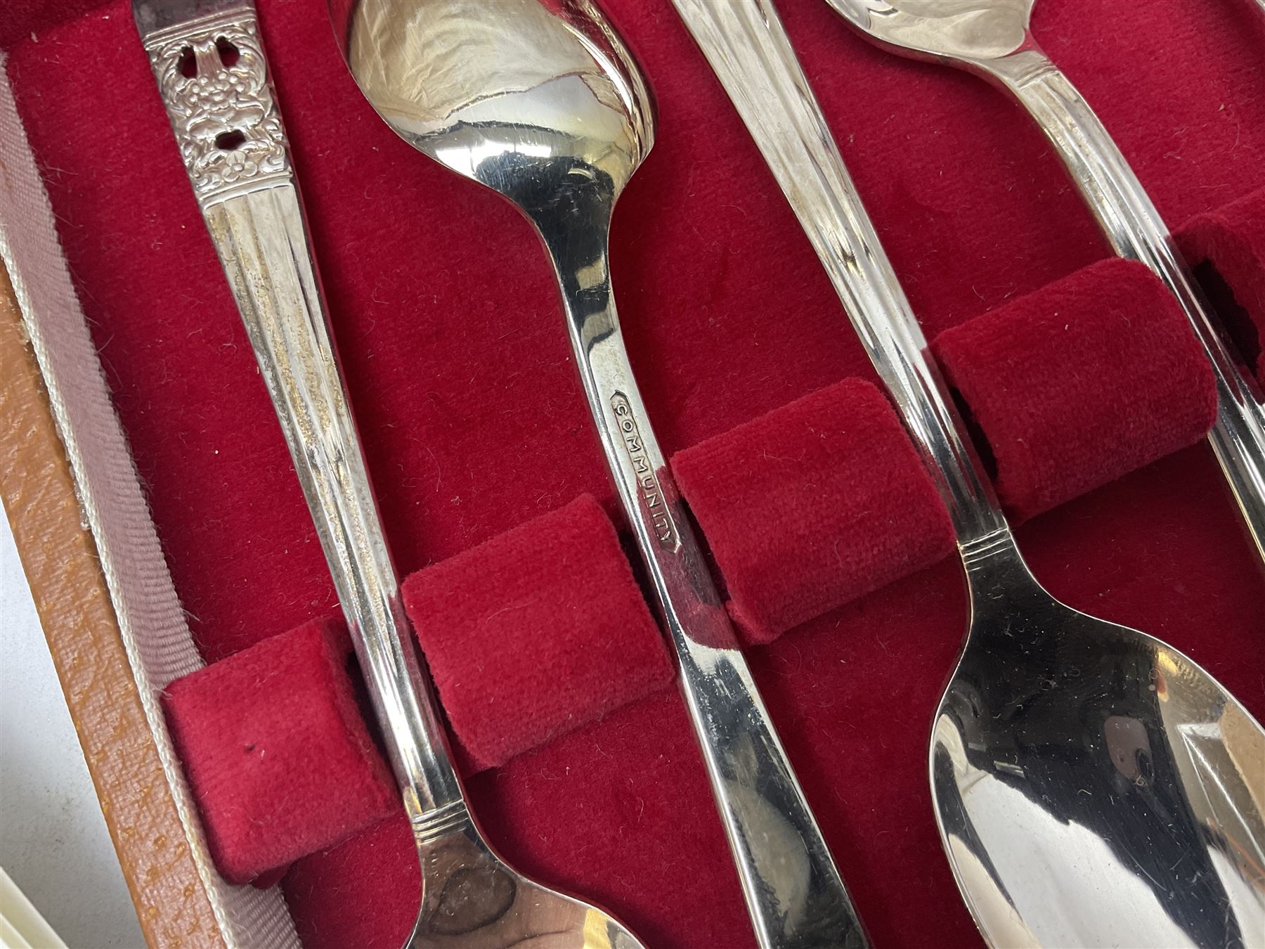 Group of silver to include cased set of six silver handled knives hallmarked Birmingham 1921 by Raeno Silver Plate Co, three hallmarked napkin rings etc together with silver plated and other metalware etc