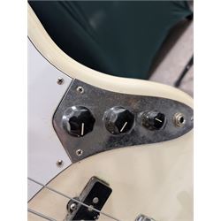 Fender jazz bass guitar, serial no. MZ7182451 made in Mexico c.2007, with cream body, white scratch plate, maple neck, guitar L120cm