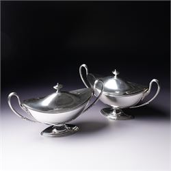 Pair of silver plated sauce tureens and covers of oval form with reeded loop handles L25cm overall