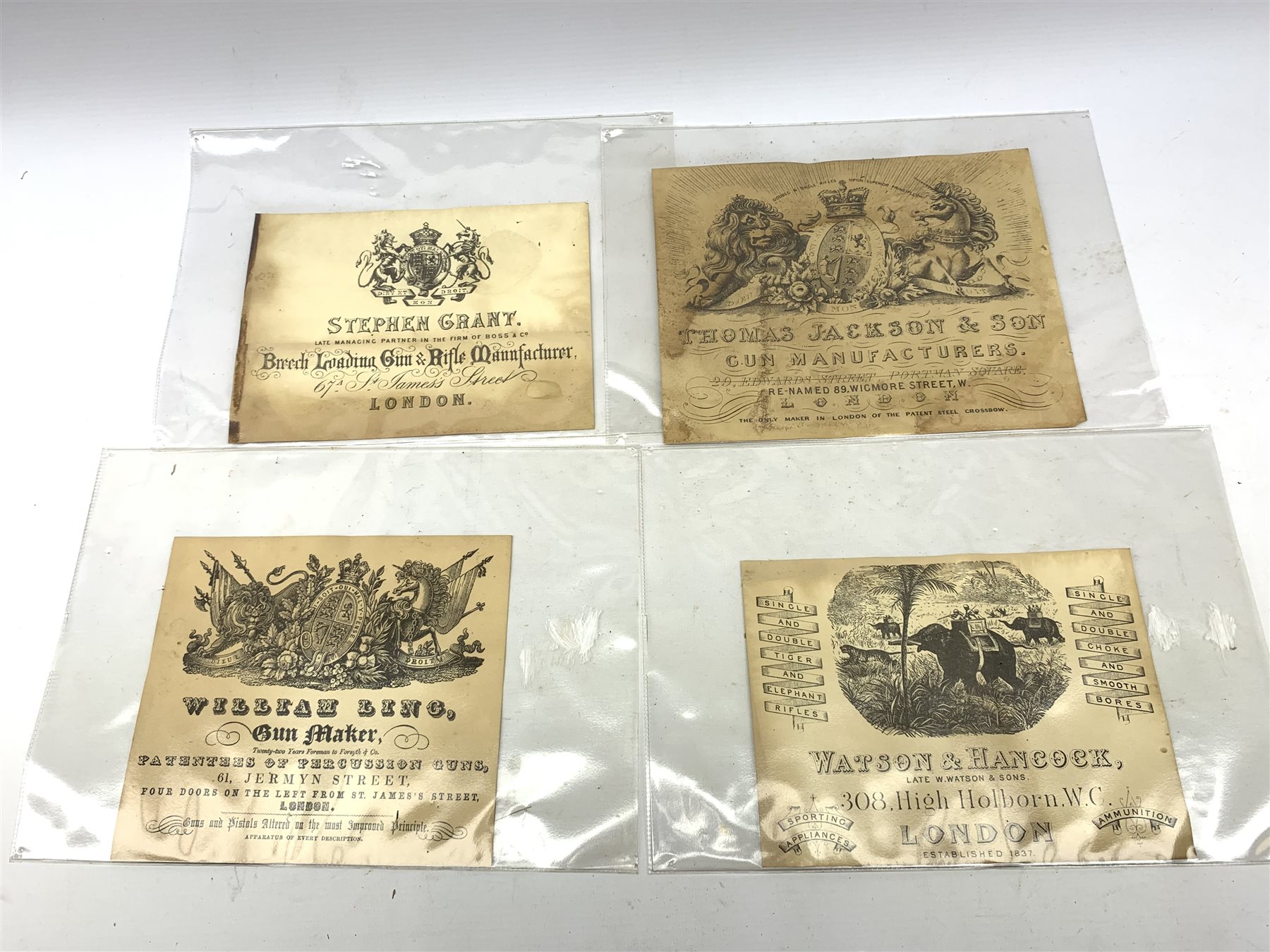 Brass and tin powder magazine by B.E. Chaplin of conical form with glazed see-through nozzle H27cm; eight reprinted gun case labels for Holland & Holland, Thomas Jackson & Son, William Ling, Watson & Hancock, Williams & Powell etc; and quantity of empty cartridge boxes and pellet tins