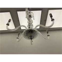 Glass chandelier with thirteen curved branches, with drip pans, glass swags and droppers, together with another smaller six branched example