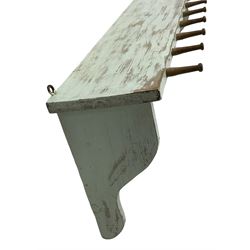 Distressed paint and wax finish wall hanging coat rack