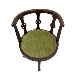 Pair of Edwardian mahogany tub shaped chairs, wheel motif back