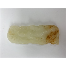 A white Hetian and russet carved jade buddha, H9.5cm.