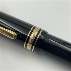 Montblanc Meisterstuck No. 149 fountain pen, the black plastic barrel and cap with gilt clip and banding, and 14ct white and yellow gold nib marked 4810 14C 585, L14.5cm