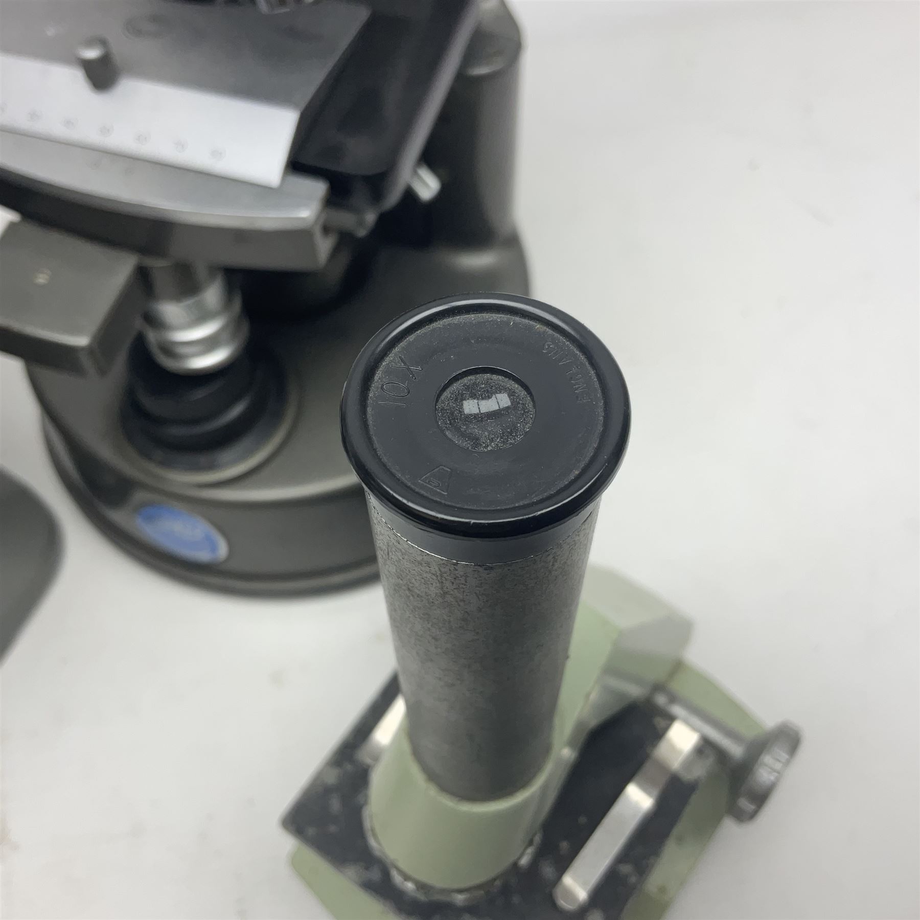 Four microscopes, comprising C Baker London Vickers, Back Diamax no 40956, Opax ABF no 232733 and one other 