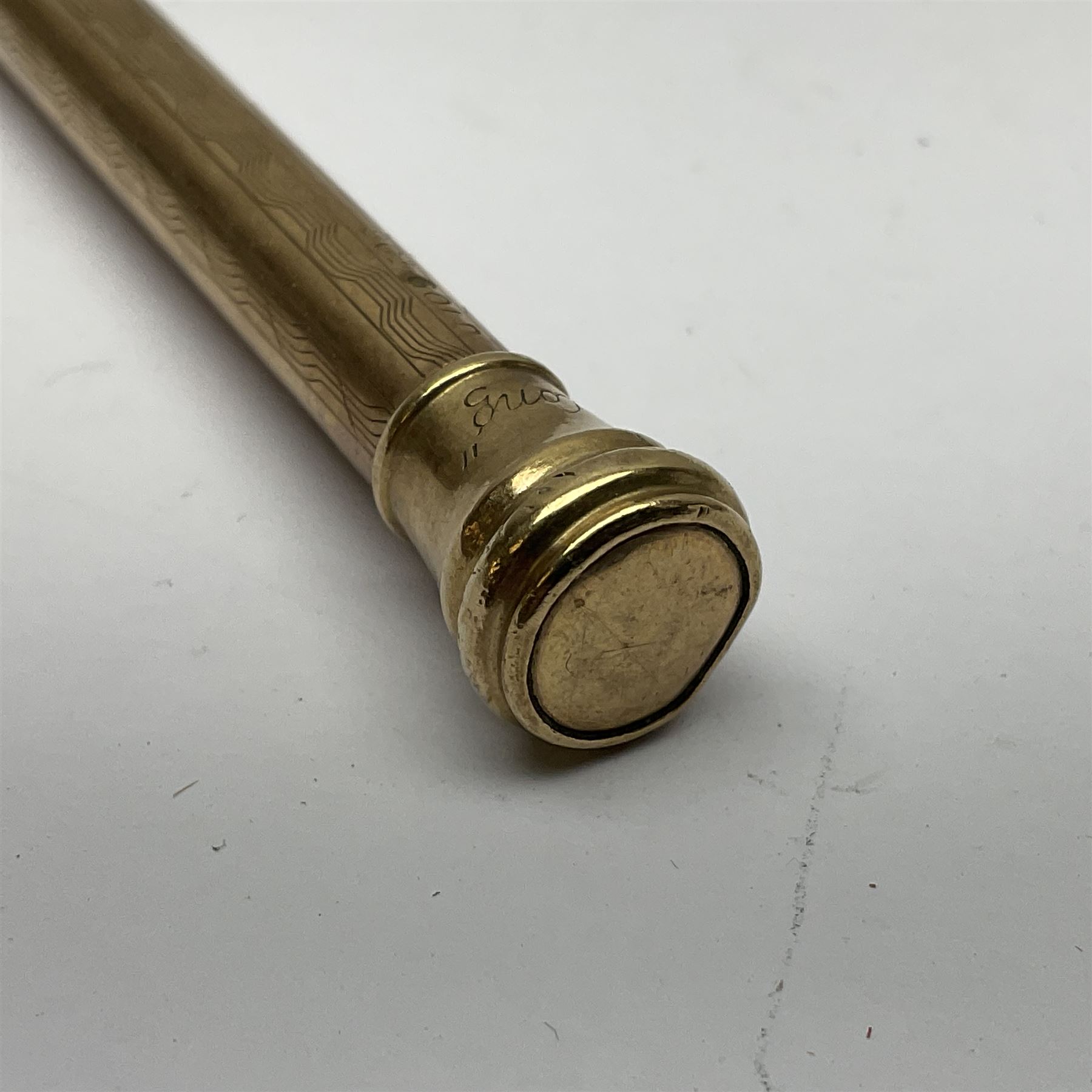 9ct gold 'Lifelong' propelling pencil, with engine turned decoration, stamped 9ct 