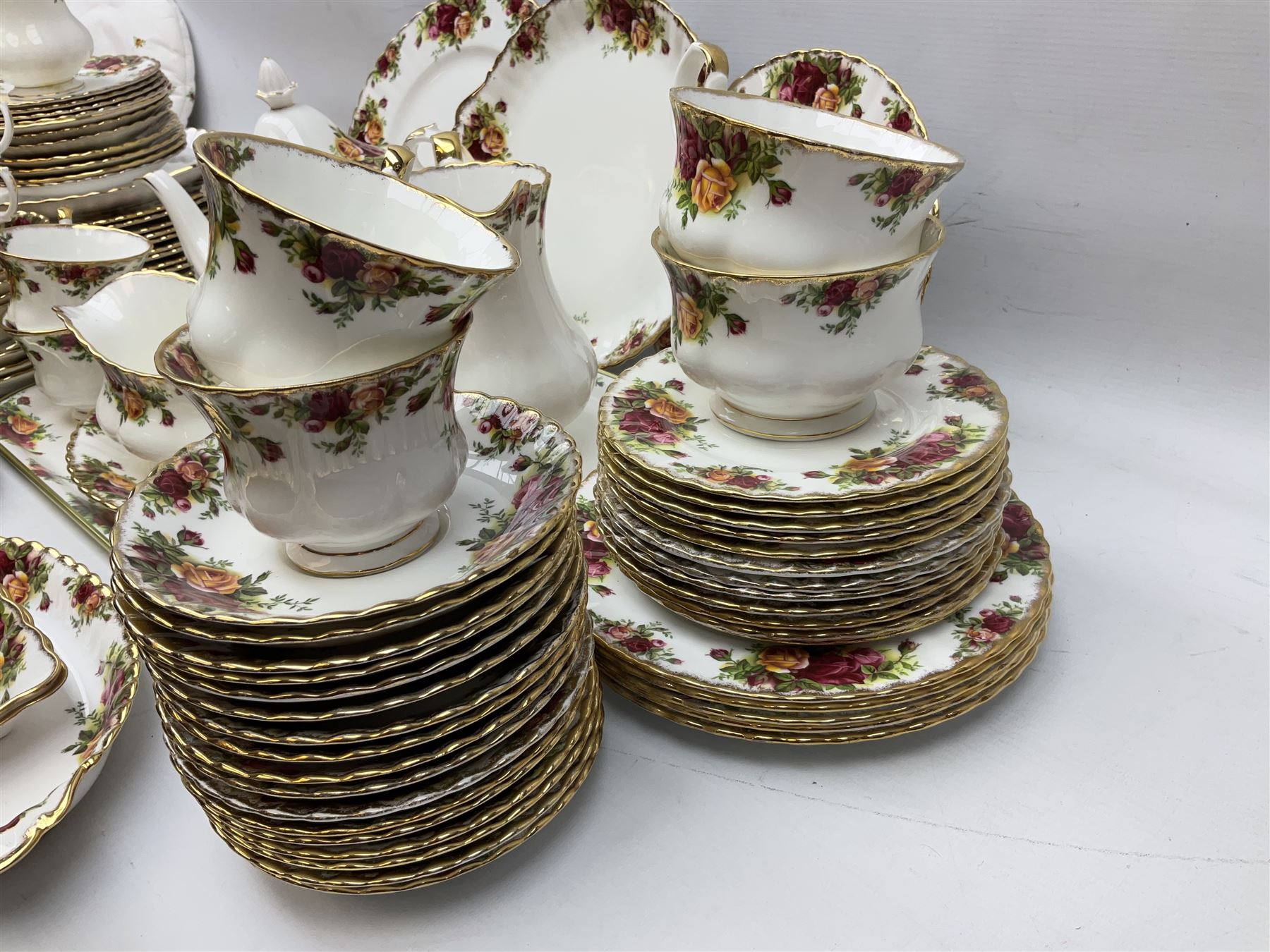 Royal Albert Old Country Roses pattern tea and part dinner service, to include teapot, two open sucriers, two jugs, thirteen cups and saucers, sixteen dessert plates, two cake plates, twelve dinner plates, sauce boat and saucer, etc (approx 114) 