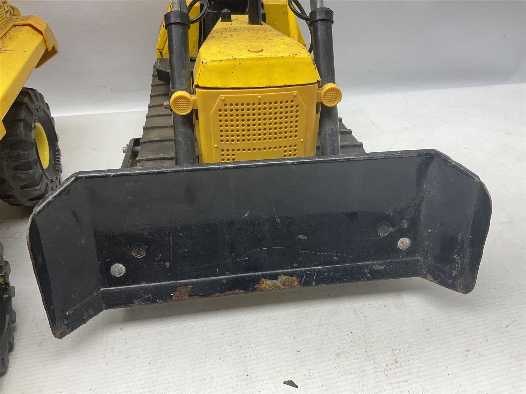 Tonka - five large scale pressed steel vehicles comprising Cement Mixer, Mobile Crane, Bulldozer and two Dumper Trucks (5)