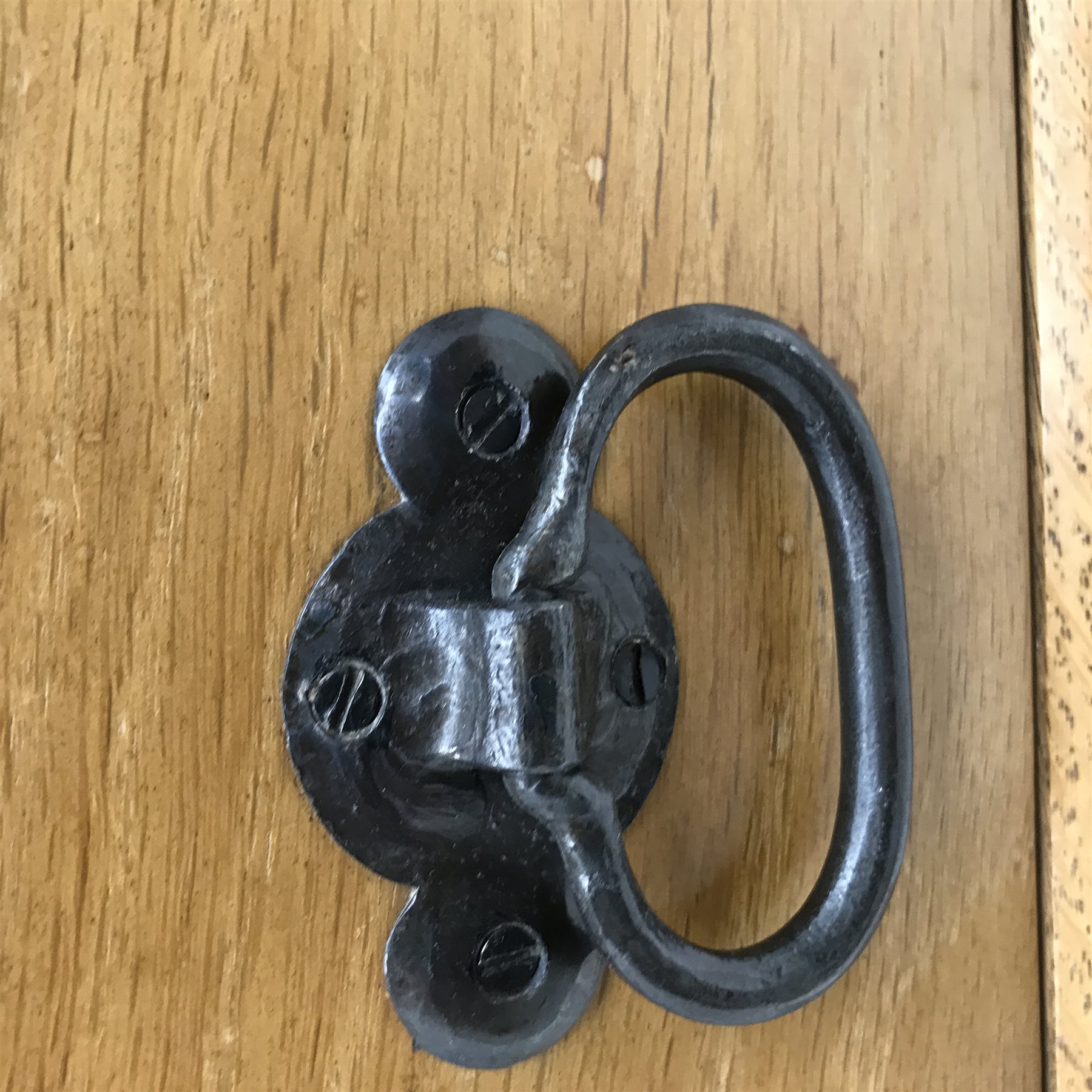 'Lizardman' panelled oak dresser, two heights plate rack above base fitted with three drawers, double cupboard and two single cupboards, by Derek Slater of Crayke, W181cm, H167cm, D45cm
